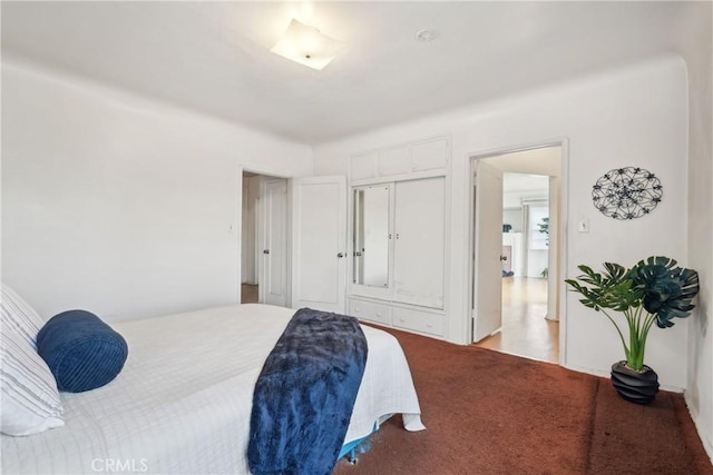 1845 W 91st Pl, Los Angeles, CA 90047 - carpeted bedroom with a closet