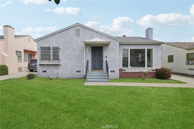 1845 W 91st Pl, Los Angeles, CA 90047 - view of front of property with a front lawn, a chimney, stucco siding, and crawl space