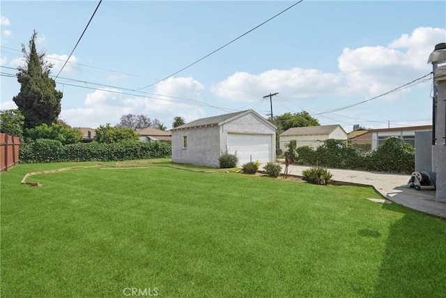1845 W 91st Pl, Los Angeles, CA 90047 - view of yard with a detached garage and an outdoor structure