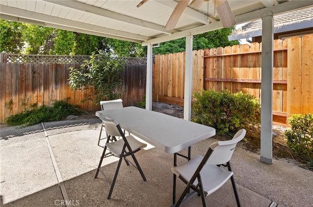 349 Silver Star Ct, Merced, CA 95348 - view of patio with outdoor dining area, a fenced backyard, and a ceiling fan