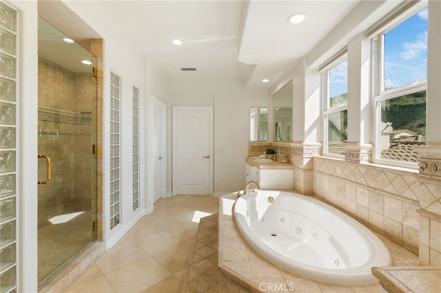 20112 Via Cellini, Porter Ranch, CA 91311 - bathroom with a stall shower, a jetted tub, tile patterned flooring, recessed lighting, and a sink