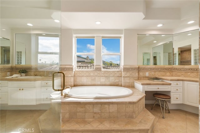 20112 Via Cellini, Porter Ranch, CA 91311 - full bath featuring tile patterned flooring, a bath, vanity, recessed lighting, and decorative backsplash