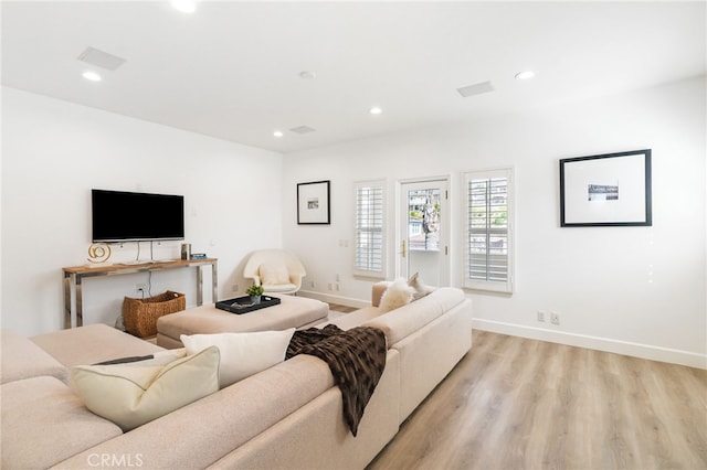 20112 Via Cellini, Porter Ranch, CA 91311 - living room featuring light wood-style floors, recessed lighting, and baseboards