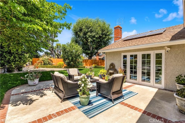 view of patio featuring french doors and outdoor lounge area