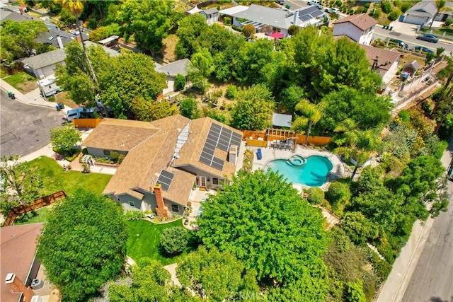 aerial perspective of suburban area with a pool