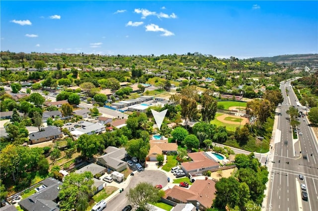 aerial view of property's location featuring nearby suburban area