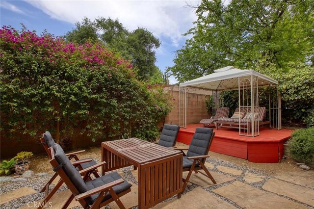 8016 Cora St, Sunland, CA 91040 - view of patio / terrace with a gazebo, a deck, and fence
