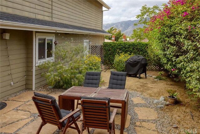 8016 Cora St, Sunland, CA 91040 - view of patio featuring outdoor dining area, a mountain view, and a grill