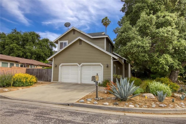 8016 Cora St, Sunland, CA 91040 - traditional-style home with fence, driveway, and an attached garage