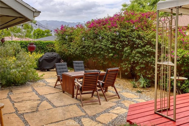 8016 Cora St, Sunland, CA 91040 - view of patio / terrace featuring a mountain view, outdoor dining area, and area for grilling