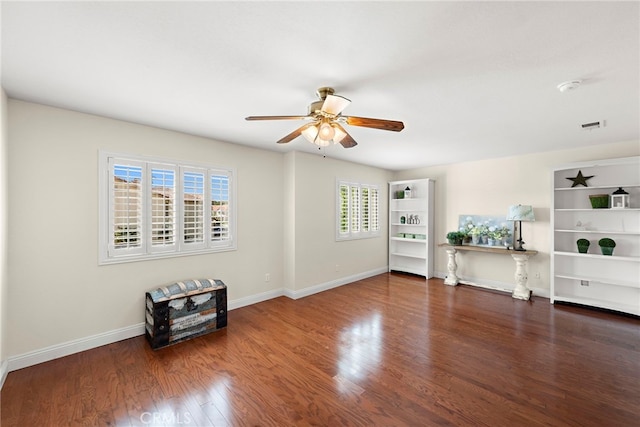 2 Anglesite, Rancho Santa Margarita, CA 92688 - unfurnished living room featuring ceiling fan, plenty of natural light, wood finished floors, and baseboards