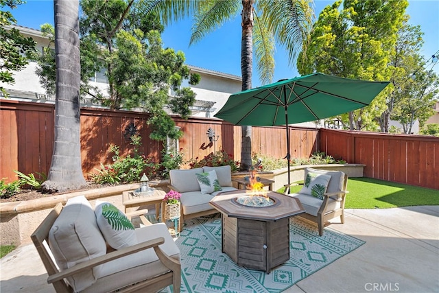 2 Anglesite, Rancho Santa Margarita, CA 92688 - fenced backyard featuring a patio and an outdoor living space with a fire pit