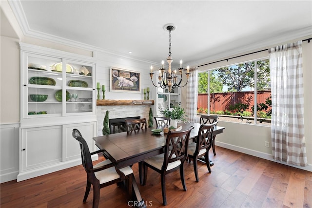 2 Anglesite, Rancho Santa Margarita, CA 92688 - dining space with a chandelier, crown molding, and wood finished floors