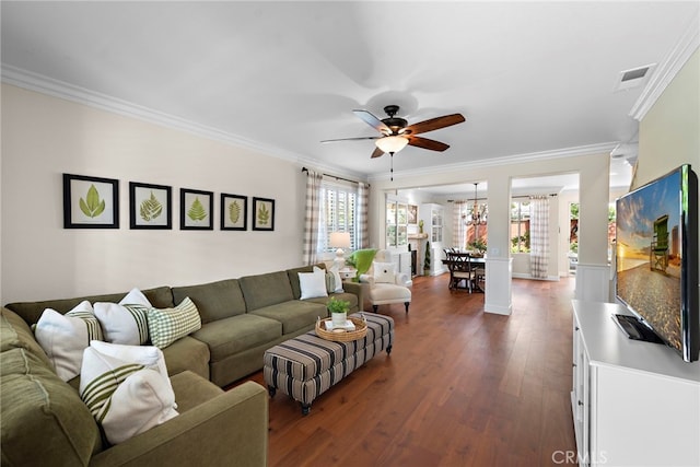 2 Anglesite, Rancho Santa Margarita, CA 92688 - living room with a ceiling fan, ornamental molding, dark wood-style floors, and a chandelier