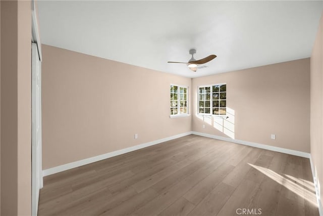 17725 Tude Ln, Apple Valley, CA 92307 - spare room featuring ceiling fan, baseboards, and wood finished floors