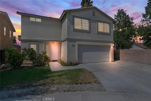 1113 Juniper Ct, San Jacinto, CA 92582 - view of front facade with an attached garage, stucco siding, concrete driveway, and a tiled roof