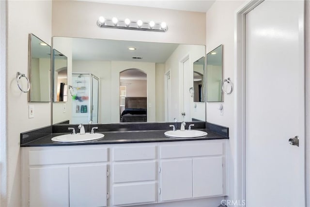 1113 Juniper Ct, San Jacinto, CA 92582 - full bathroom featuring double vanity, ensuite bath, and an enclosed shower