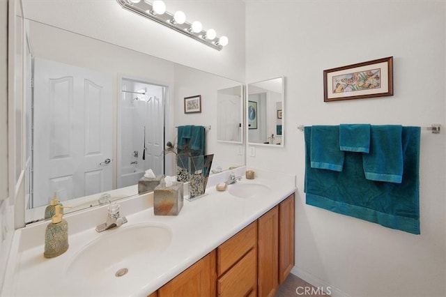 25415 Verne Ct, Stevenson Ranch, CA 91381 - bathroom featuring double vanity and  shower combination