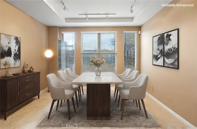25415 Verne Ct, Stevenson Ranch, CA 91381 - dining space with track lighting, baseboards, and light tile patterned floors