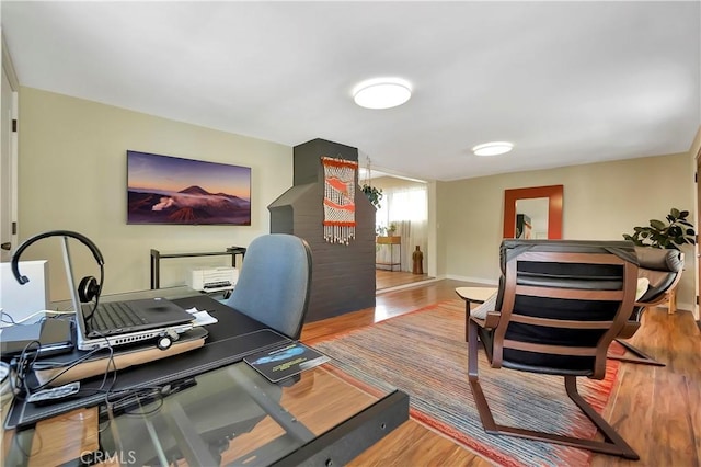 3235 Faust Ave, Long Beach, CA 90808 - home office featuring wood finished floors and baseboards
