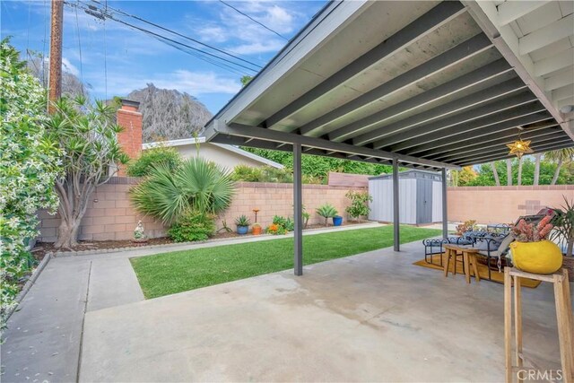 3235 Faust Ave, Long Beach, CA 90808 - view of patio / terrace with a shed and an outbuilding