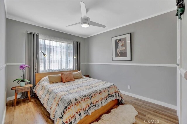 3235 Faust Ave, Long Beach, CA 90808 - bedroom featuring light wood-type flooring, ornamental molding, baseboards, and ceiling fan