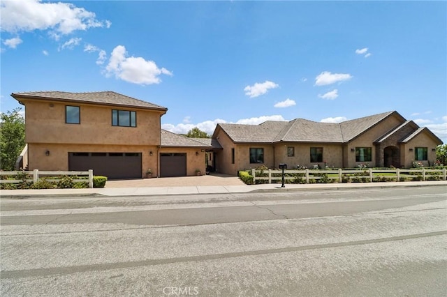 4004 Snowgoose St, Simi Valley, CA 93065 - view of front of property featuring fence, stucco siding, driveway, and an attached garage