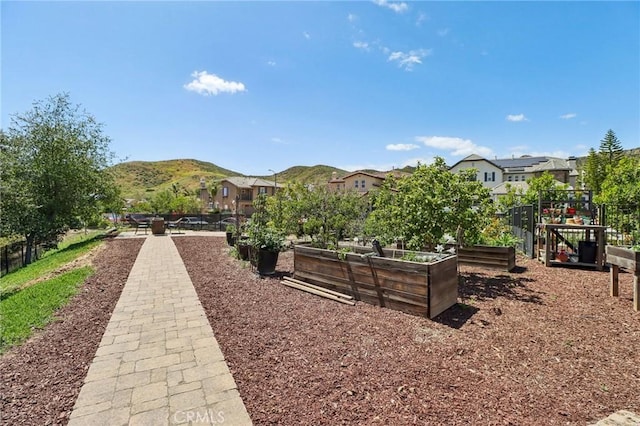4004 Snowgoose St, Simi Valley, CA 93065 - surrounding community featuring a garden, a residential view, a mountain view, and fence