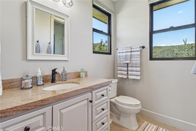 4004 Snowgoose St, Simi Valley, CA 93065 - bathroom featuring vanity, toilet, and baseboards