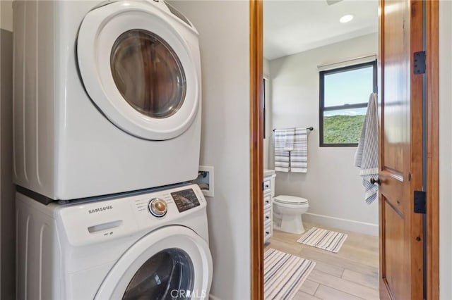 4004 Snowgoose St, Simi Valley, CA 93065 - washroom with estacked washer and dryer and baseboards