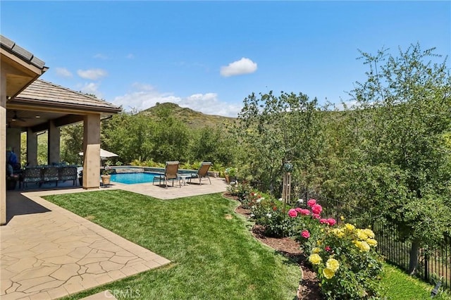 4004 Snowgoose St, Simi Valley, CA 93065 - view of yard featuring a patio, a ceiling fan, and a mountain view