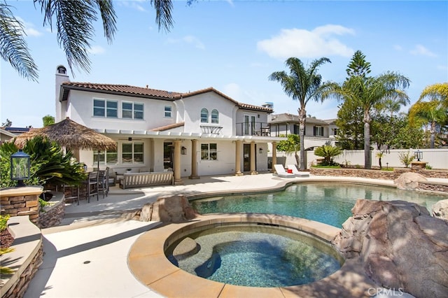 32429 Castle Ct, Temecula, CA 92592 - view of pool with a patio area and a pool with connected hot tub