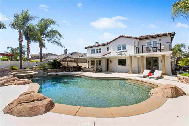32429 Castle Ct, Temecula, CA 92592 - view of pool featuring a patio area, french doors, and a pool with connected hot tub