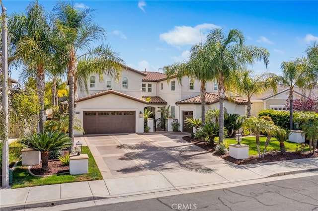 32429 Castle Ct, Temecula, CA 92592 - mediterranean / spanish house featuring a tiled roof, concrete driveway, stucco siding, and an attached garage