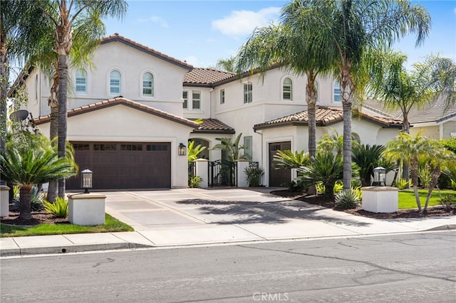 32429 Castle Ct, Temecula, CA 92592 - mediterranean / spanish home with stucco siding, a tile roof, a gate, a garage, and concrete driveway