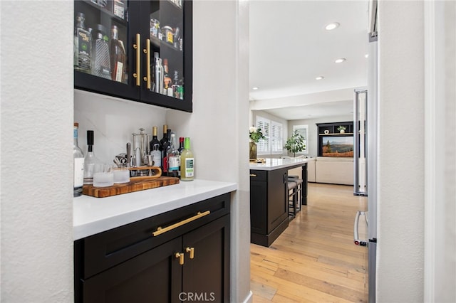 32429 Castle Ct, Temecula, CA 92592 - indoor bar featuring light wood-type flooring and recessed lighting