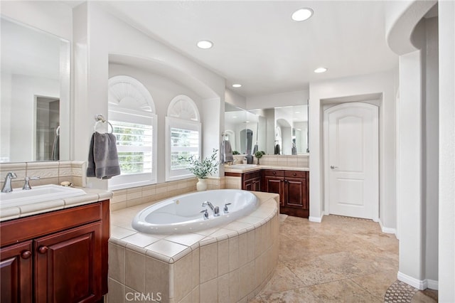 32429 Castle Ct, Temecula, CA 92592 - full bathroom with a garden tub, two vanities, and recessed lighting