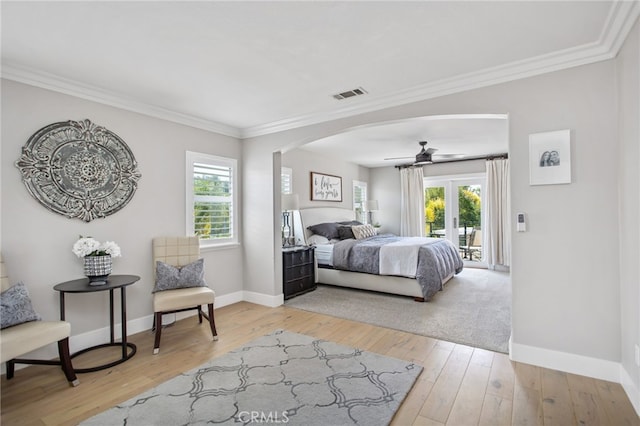 32429 Castle Ct, Temecula, CA 92592 - bedroom with access to exterior, arched walkways, ornamental molding, light wood-style floors, and a ceiling fan