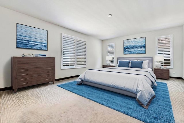 4203 Calle Del Vis, Oceanside, CA 92057 - bedroom with light colored carpet, baseboards, and multiple windows