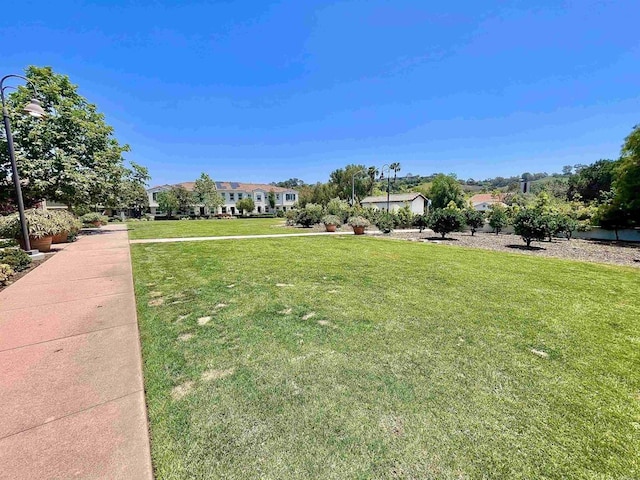 4203 Calle Del Vis, Oceanside, CA 92057 - view of property's community featuring a lawn