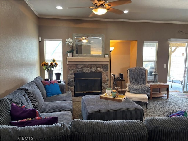 1800 Windermere Dr, Lancaster, CA 93534 - living area featuring a ceiling fan, ornamental molding, healthy amount of natural light, and a fireplace