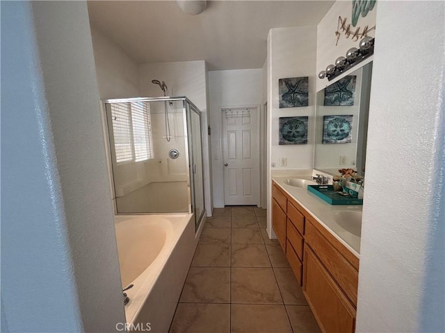 1800 Windermere Dr, Lancaster, CA 93534 - full bathroom with a shower stall, a bath, double vanity, and a textured wall