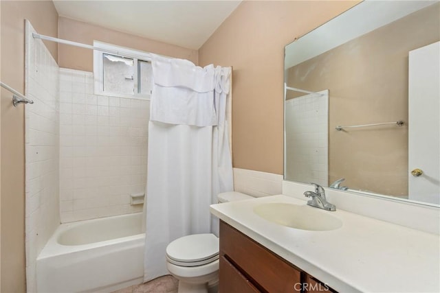 full bath featuring toilet, vanity, and shower / bath combination with curtain