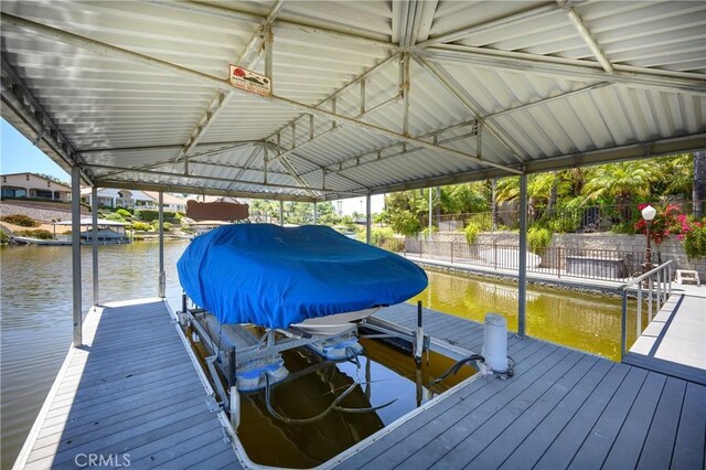 29784 Nautical Ct, Canyon Lake, CA 92587 - dock area with boat lift, a water view, and fence