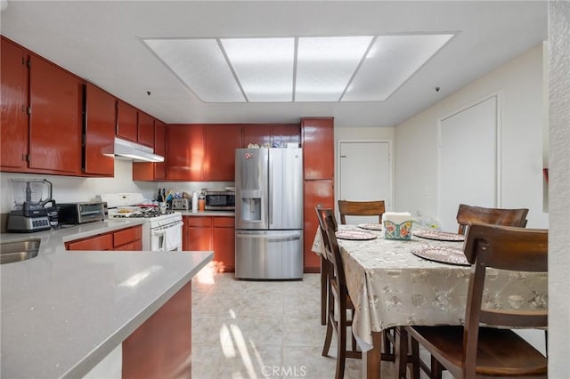 12018 Cherrywood Dr, Fontana, CA 92337 - kitchen with stainless steel appliances and under cabinet range hood