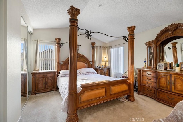 12018 Cherrywood Dr, Fontana, CA 92337 - bedroom featuring light colored carpet, a textured ceiling, lofted ceiling, and multiple windows