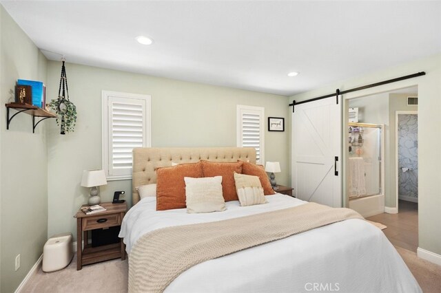 130 Bloomfield Ln, Rancho Santa Margarita, CA 92688 - bedroom with a barn door, light carpet, baseboards, recessed lighting, and multiple windows