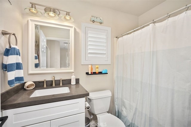 130 Bloomfield Ln, Rancho Santa Margarita, CA 92688 - bathroom featuring vanity, toilet, and a shower with curtain