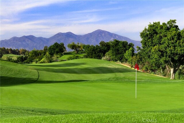 130 Bloomfield Ln, Rancho Santa Margarita, CA 92688 - view of property's community featuring golf course view, a mountain view, and an area to practice putting