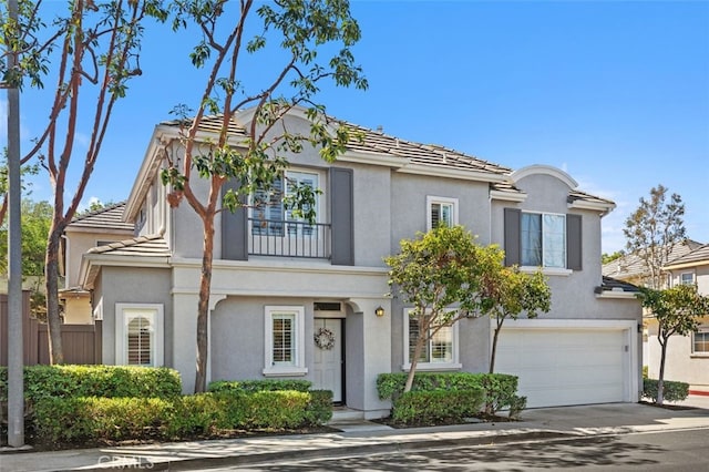 130 Bloomfield Ln, Rancho Santa Margarita, CA 92688 - view of front of house with a garage, stucco siding, and driveway